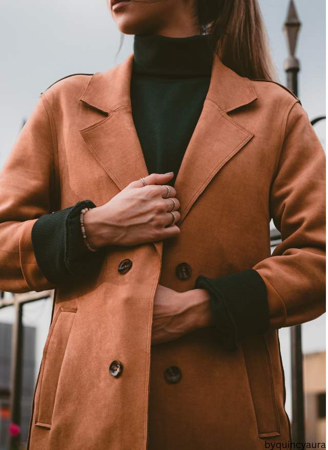woman wearing soft turtleneck with jacket