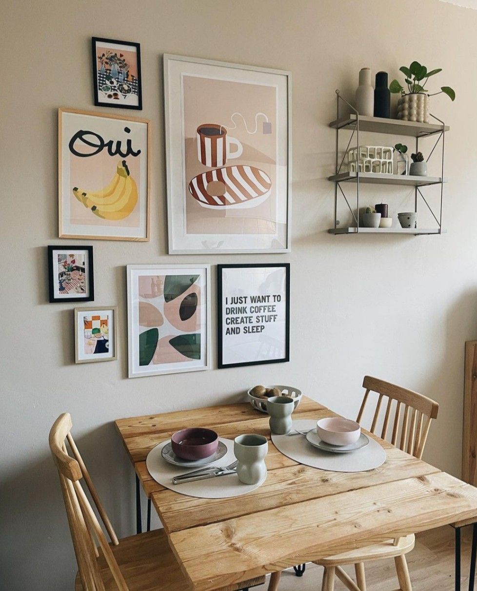 Small dining room with simple wall art above the table