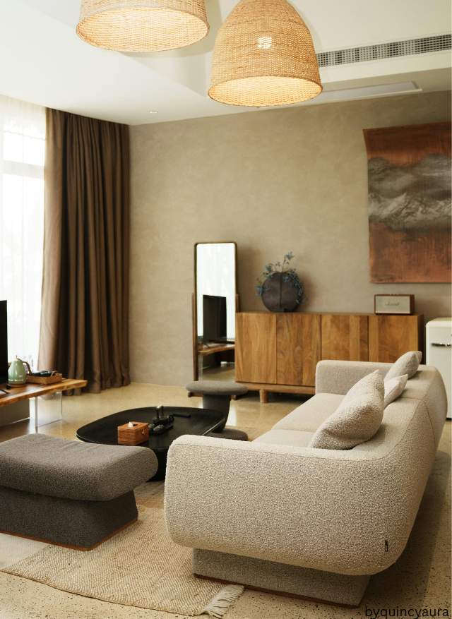 Small living room with light furniture, layered textures, Bright, airy, and stylish.