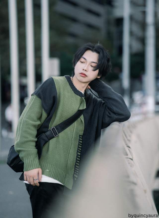 An image of a man with a cross bag.