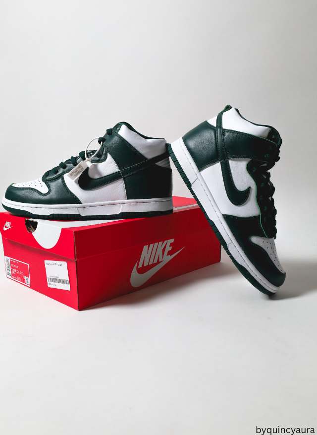 A pair of men’s sneakers neatly displayed on a clean surface.