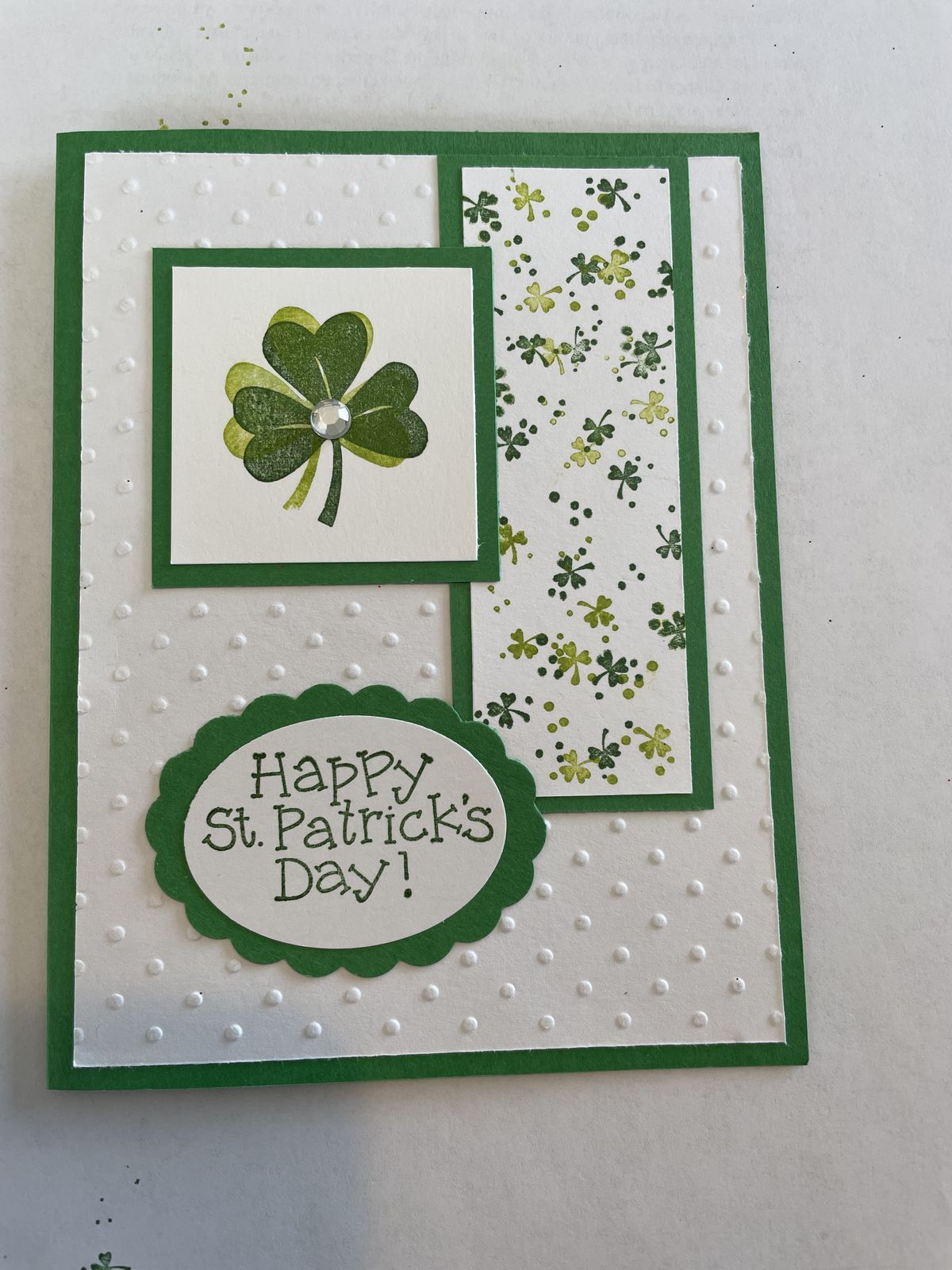 A cozy St. Patrick’s Day table with handmade paper place cards.