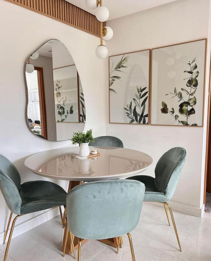 Small dining room with a wall mirror
