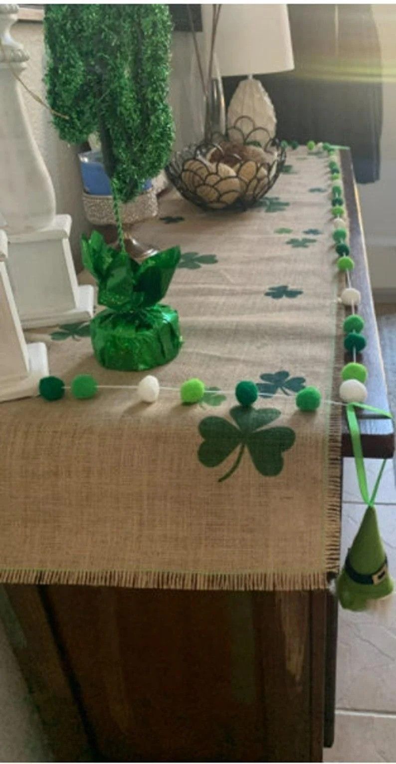 A green fabric table runner.