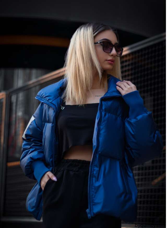 A woman wearing a stylish jacket in winter weather