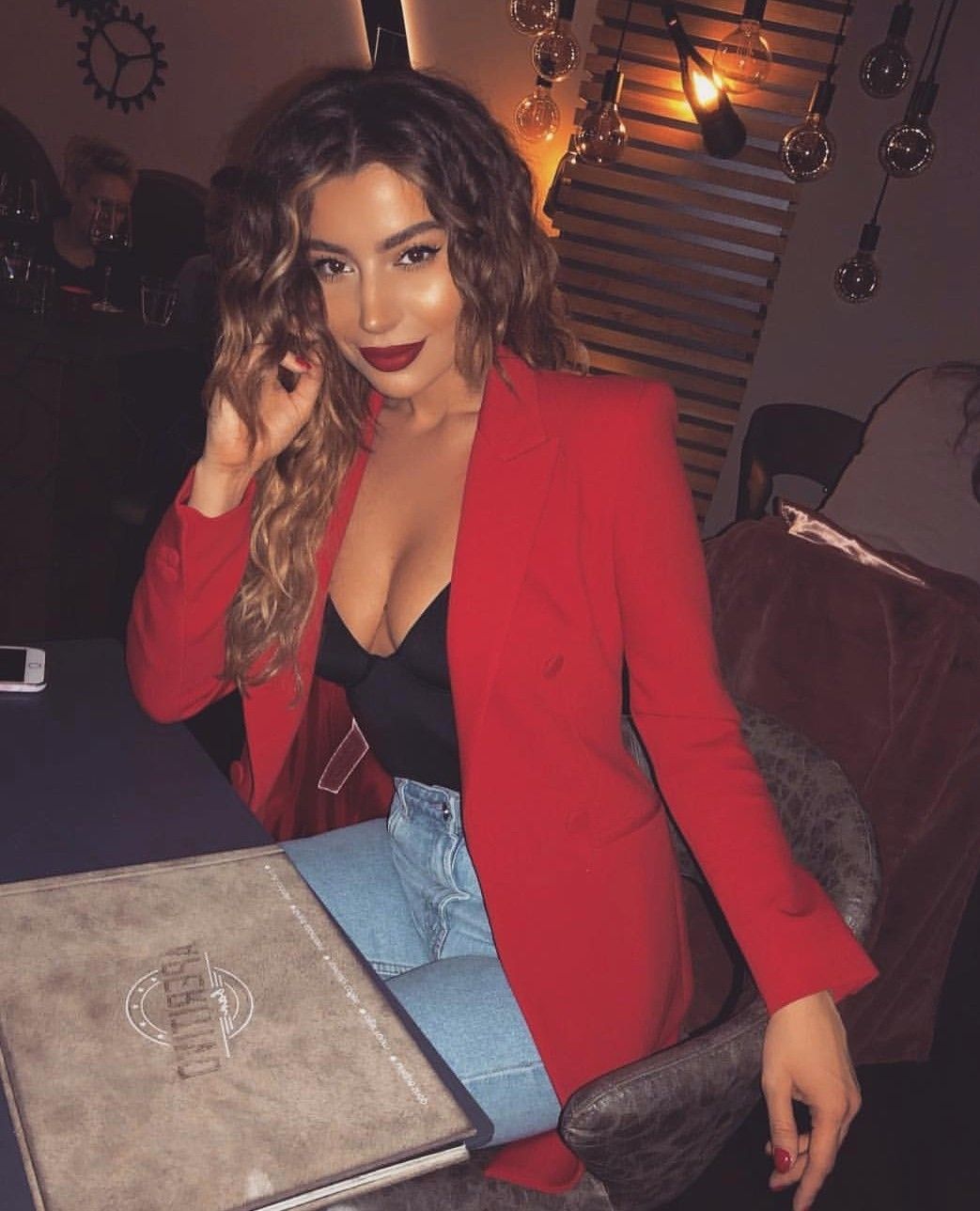 A simple yet chic Valentine’s Day outfit styled with a blazer and accessories.