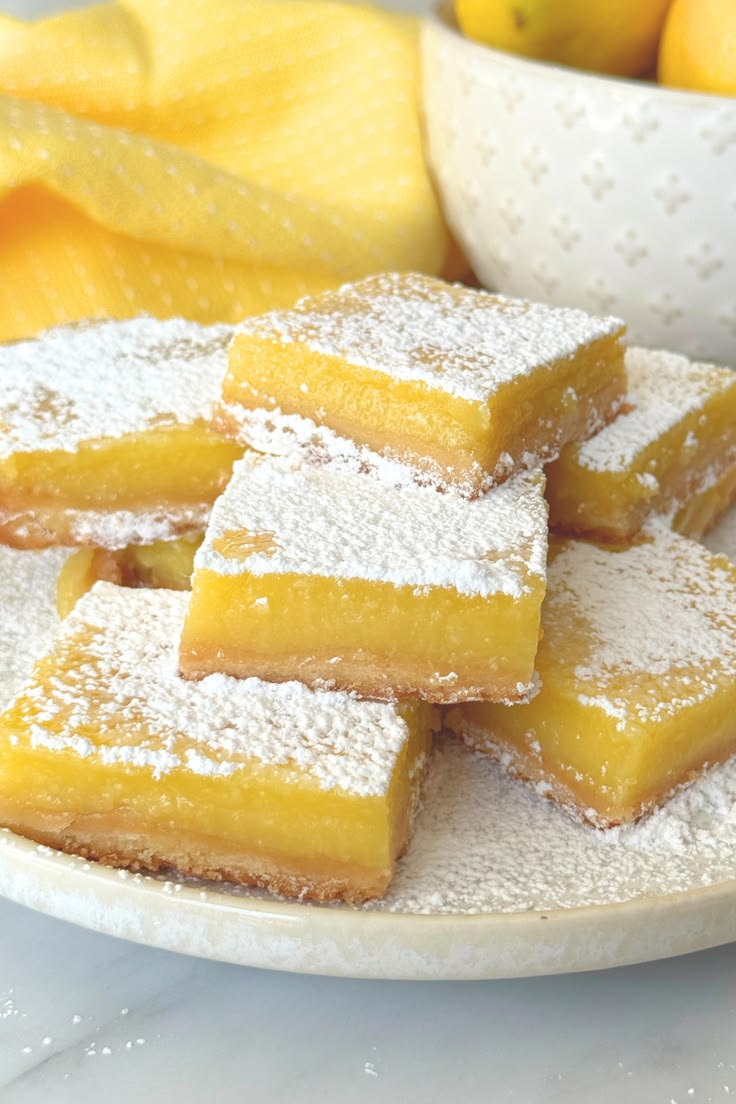 Lemon Bars with powdered sugar on top of it