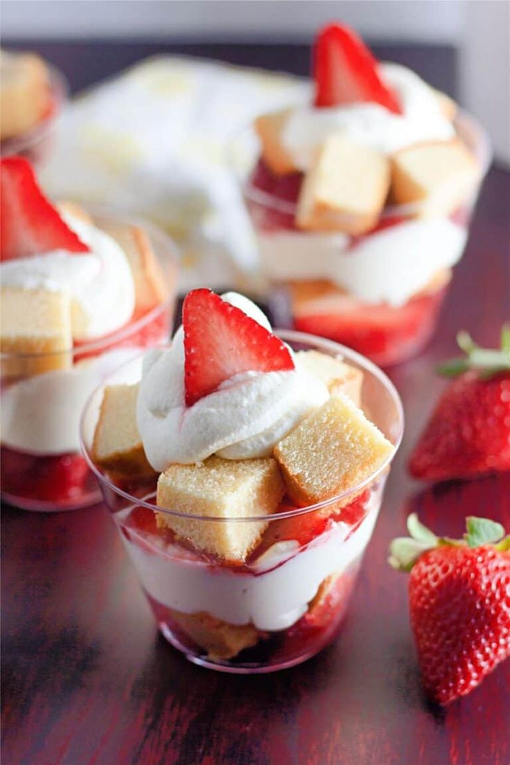 Mini strawberry shortcake cups set on a table