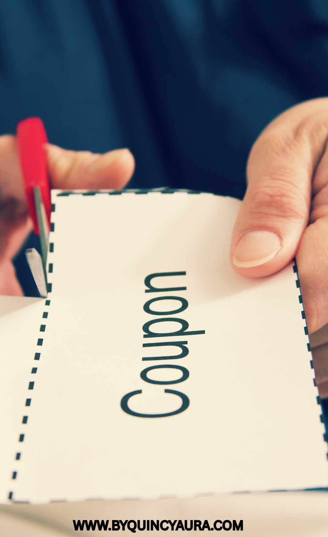 someone cutting a Coupon 