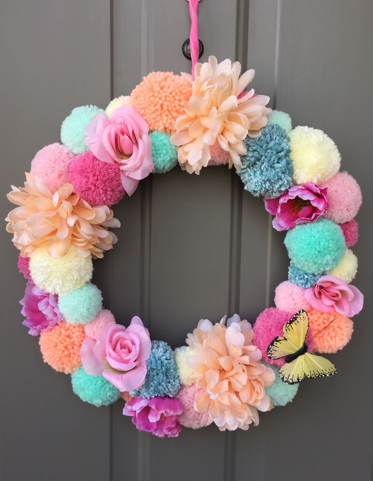 Yarn and Pom-Pom Flower Wreath