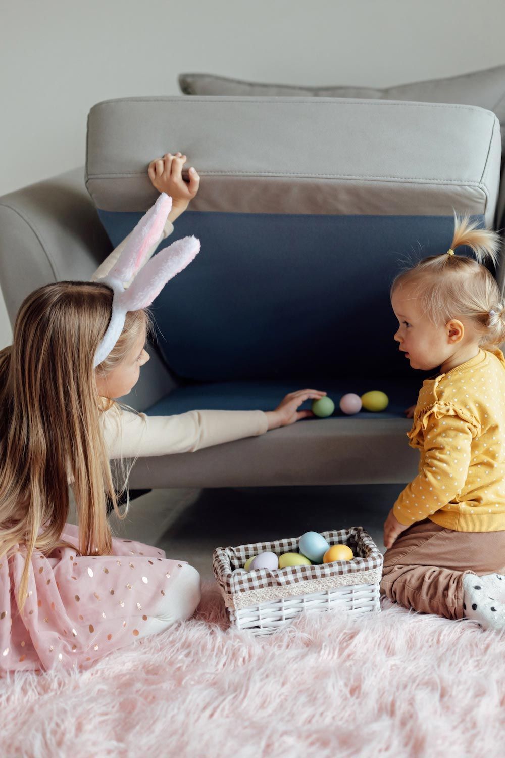 children looking for easter eggs