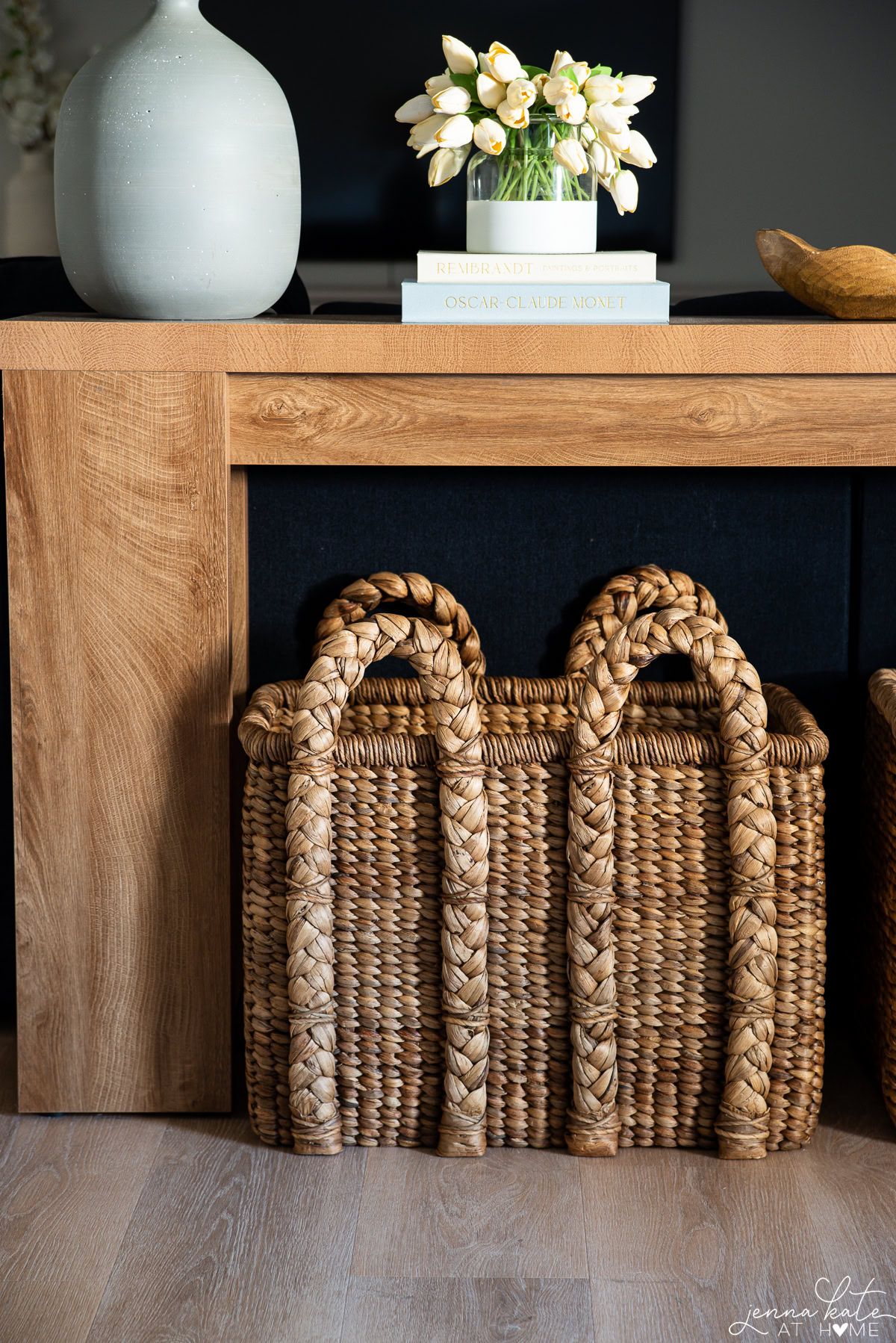 baskets tucked under a console table,