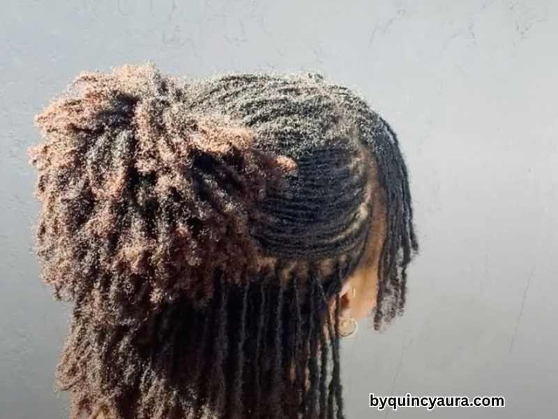 Young woman choosing the best loc starter method with twists, comb coils, and interlocking for starting locs for beginners