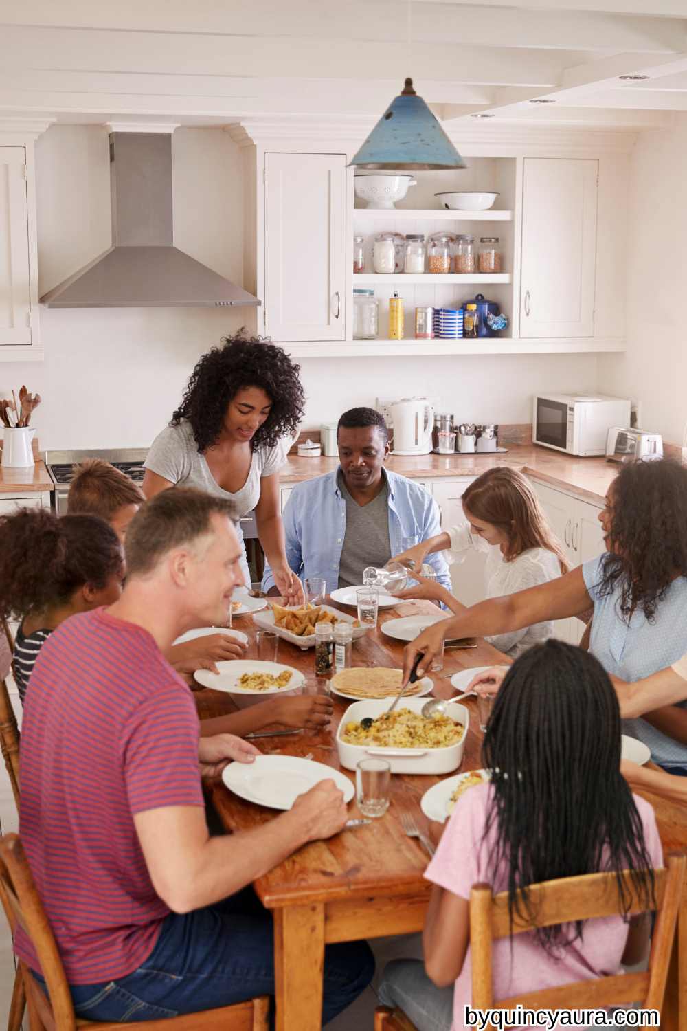 Family eating breakfast together.