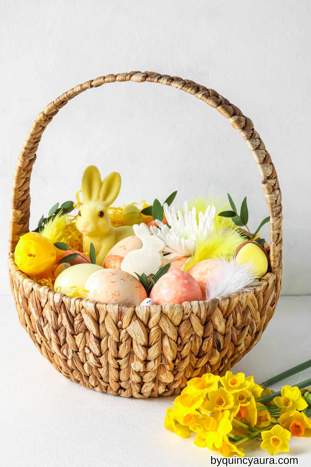 flowers around a basket, eggs, or bunny props,