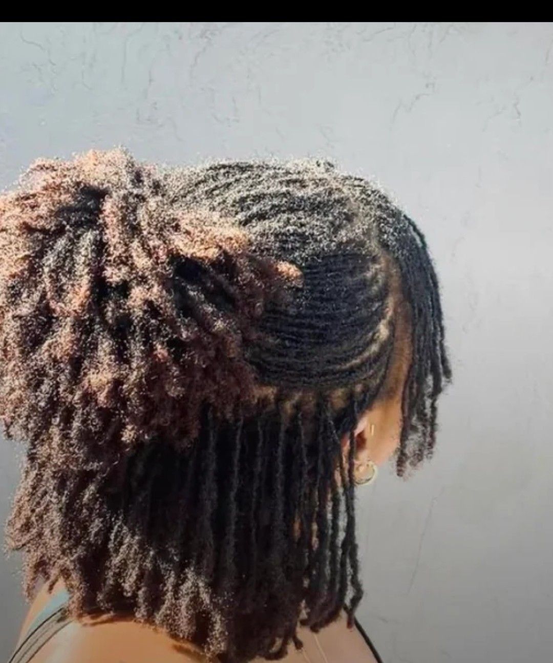 girl showing us her locs