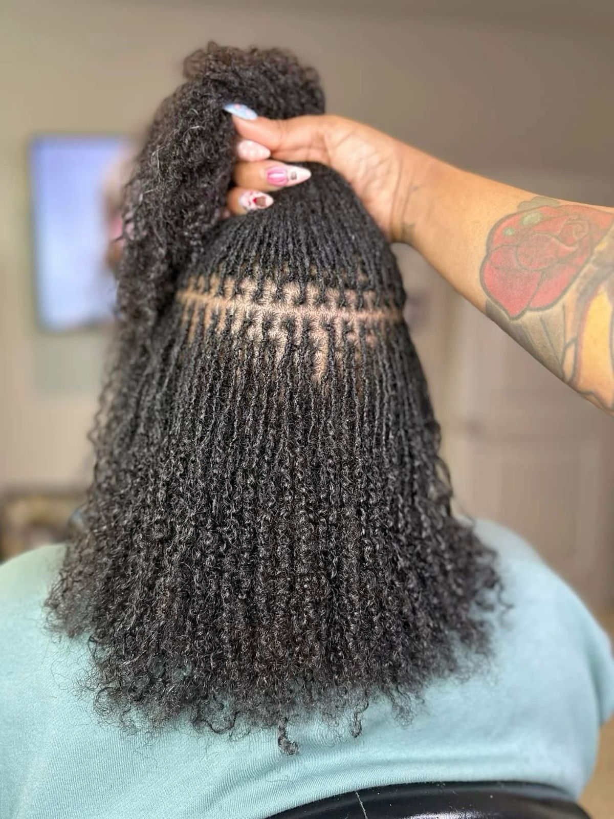 A girl with micro locs