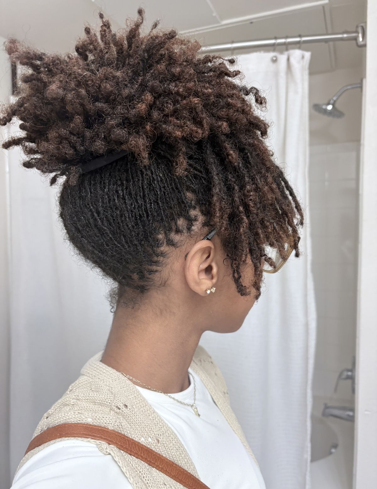 A girl showing us her locs