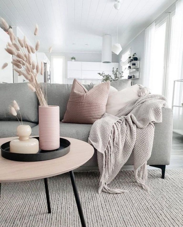 pairing a soft gray base with pale blush accents.