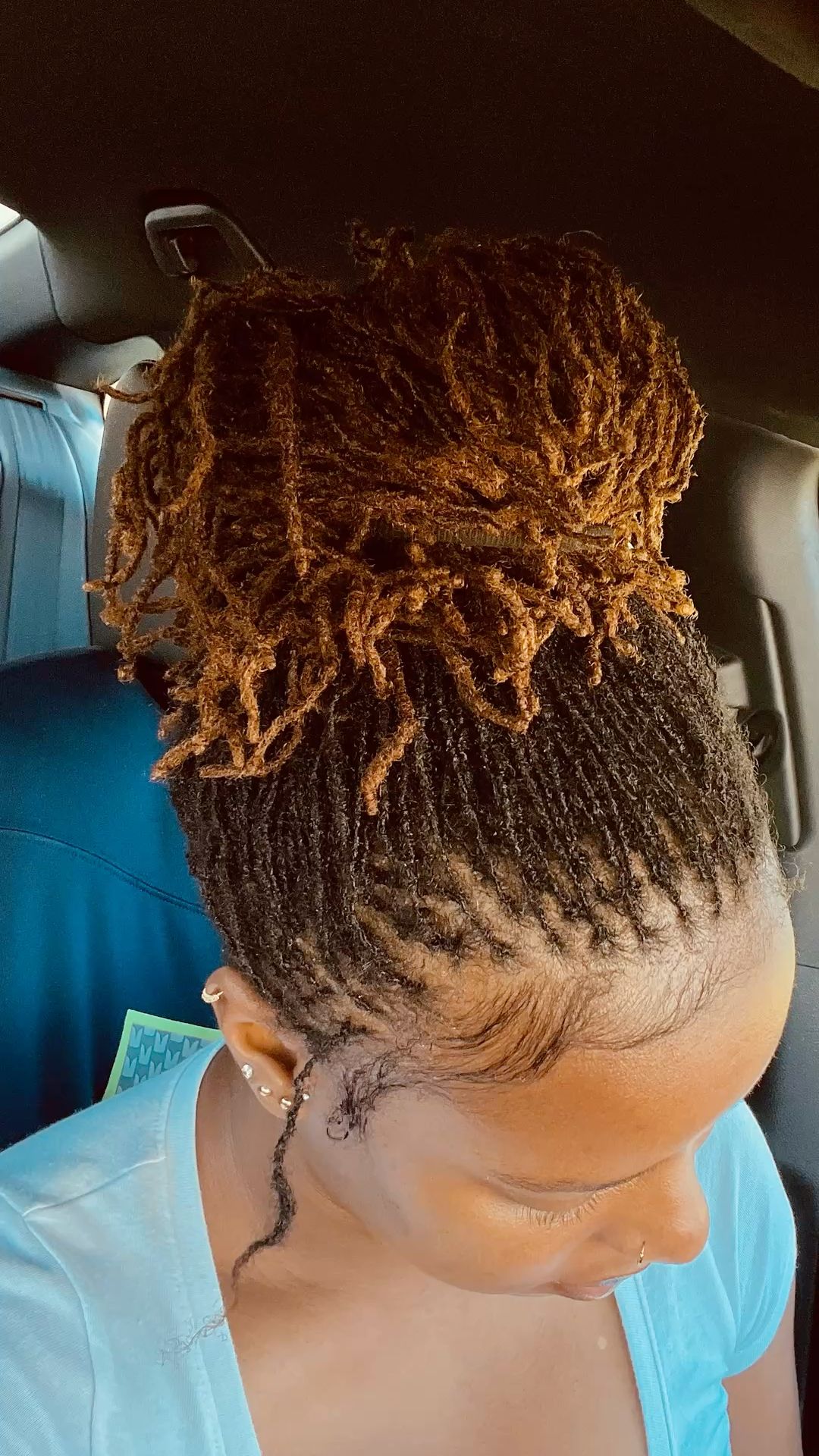 A girl showing us her locs