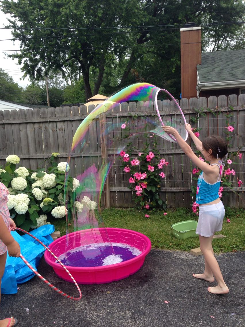 children playing with bubbles.